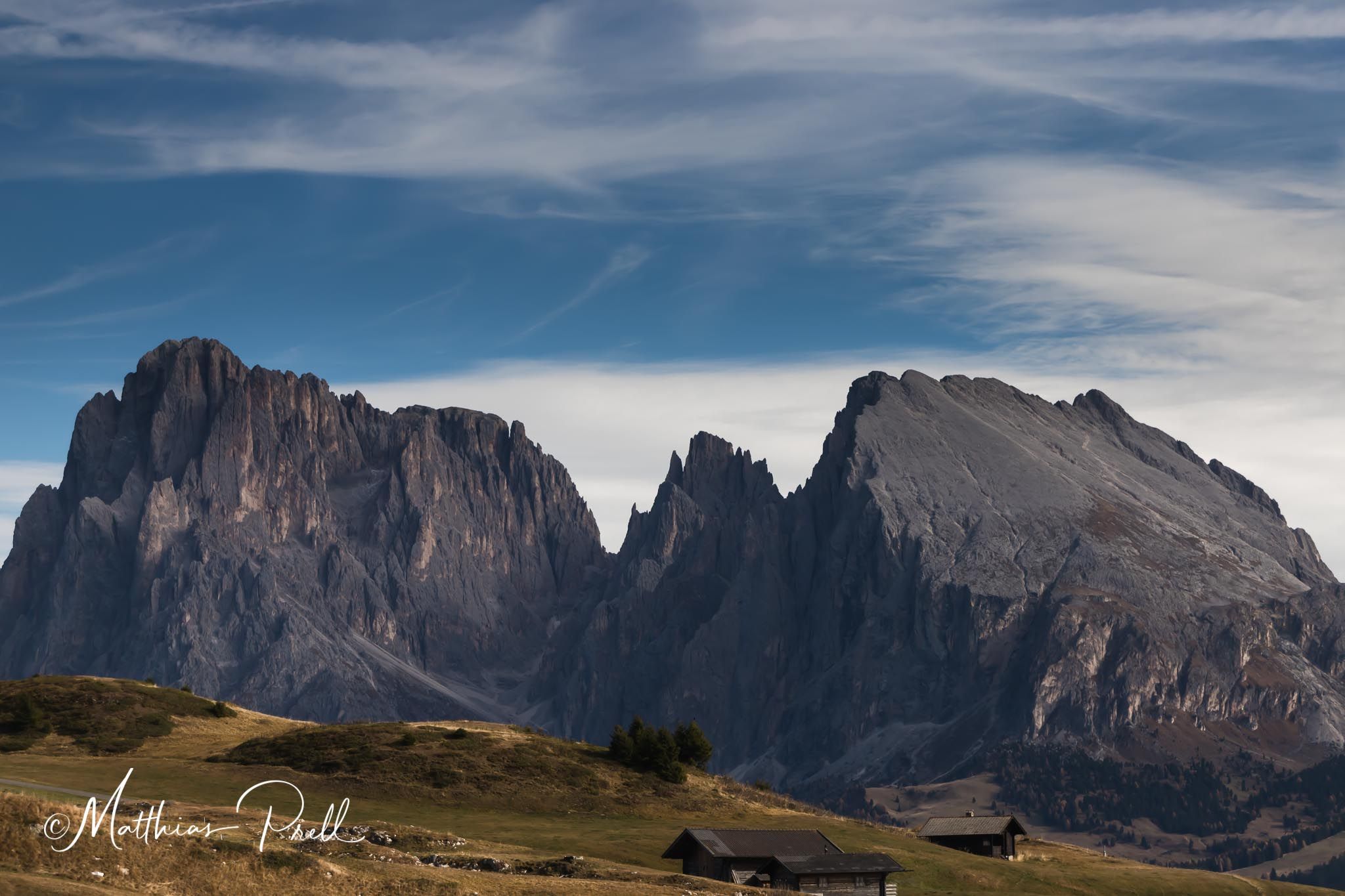 View of the Langkofel, the Fünffinger Peaks, and the Plattkofel, Italy