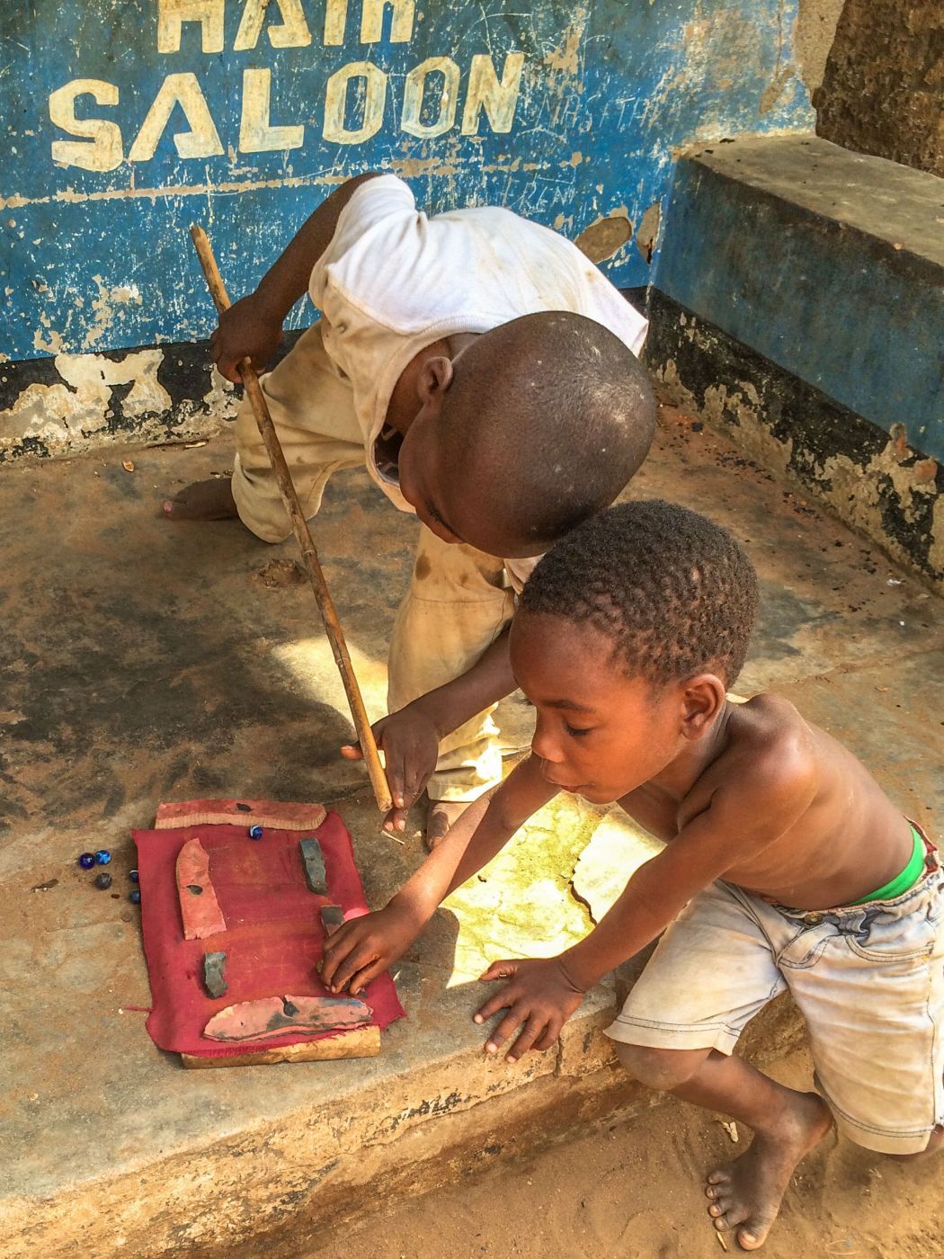 Boys playing 'Pool' Senga, Malawi