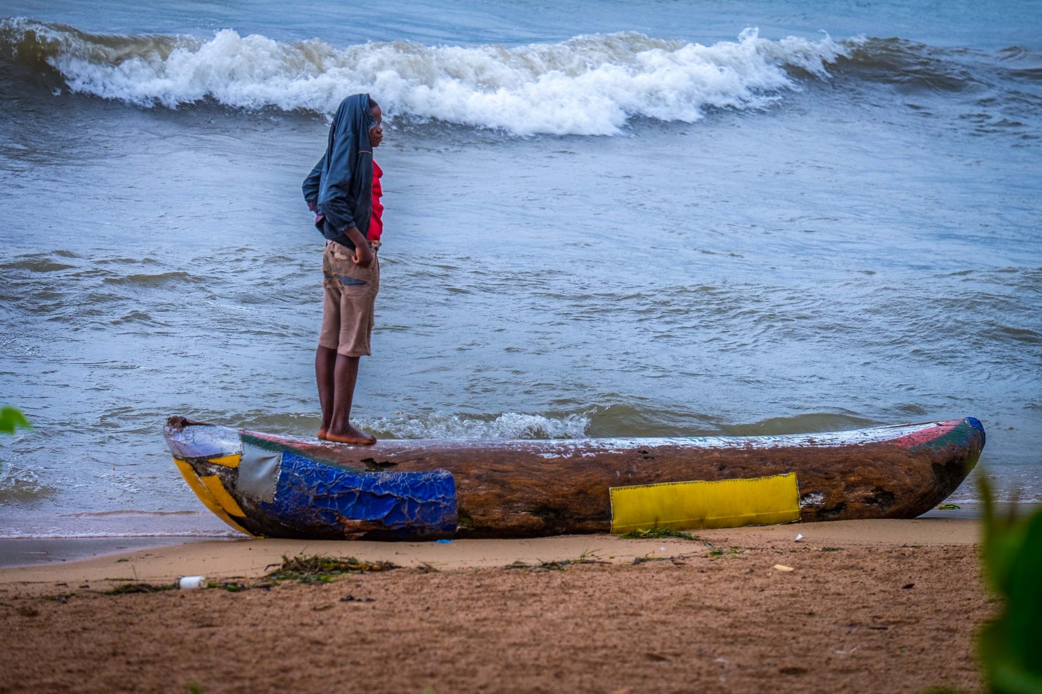 Boy on Canoe Cape Maclear, Malawi