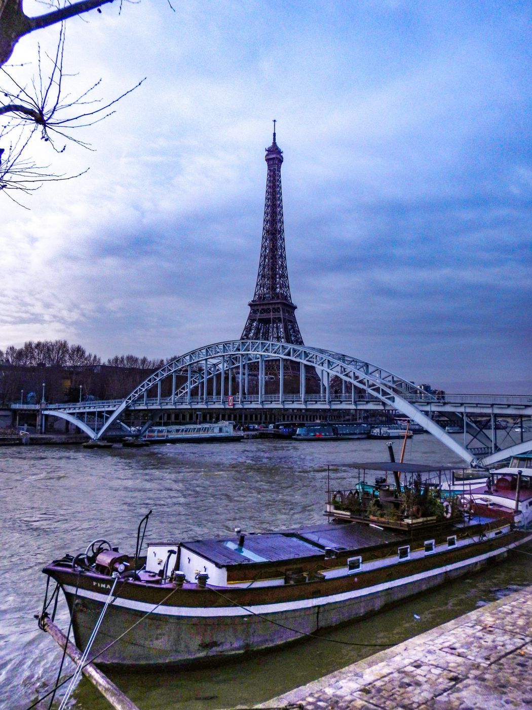 Eifel Tower, Passerelle Debilly bridge & Barge Paris, France