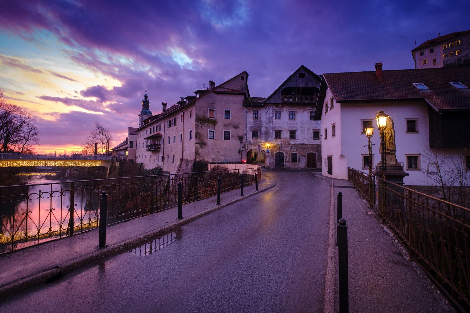 View over Stone bridge to old houses of Škofja Loka town, Slovenia