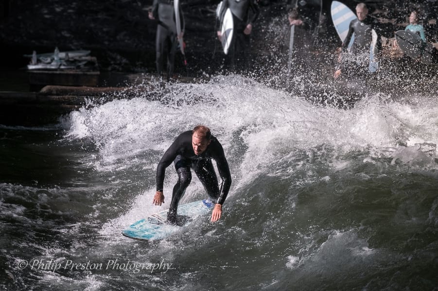 Eisbachwelle / city surfers, Munich, Germany