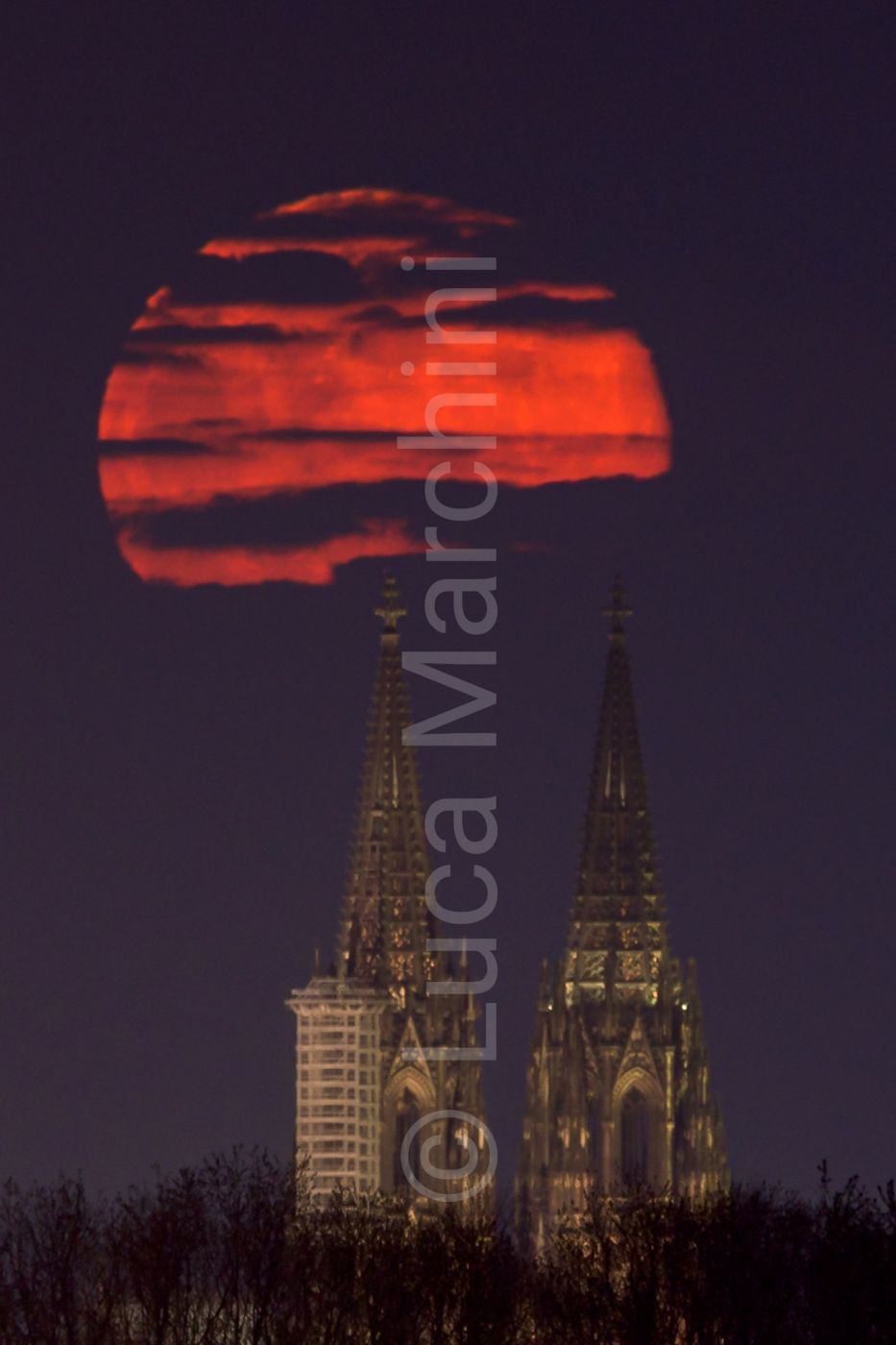 Full moon behind the Cathedral, Cologne, Germany