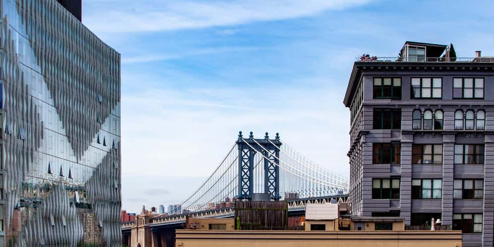 Manhattan Bridge through the buildings Brooklyn