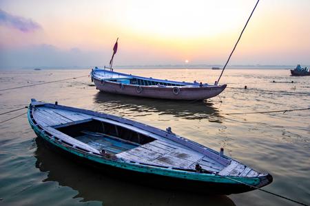 Boats on the Ganges at sunrise Varanasi