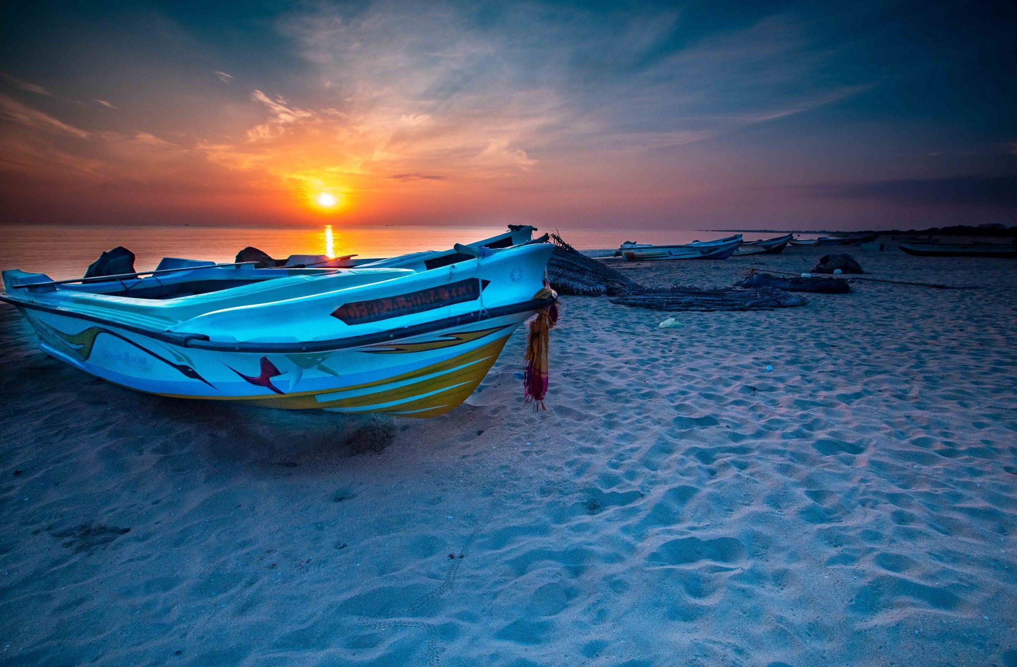 Fishing boats Sunrise Salpayaru, Kuchchaveli, Sri Lanka