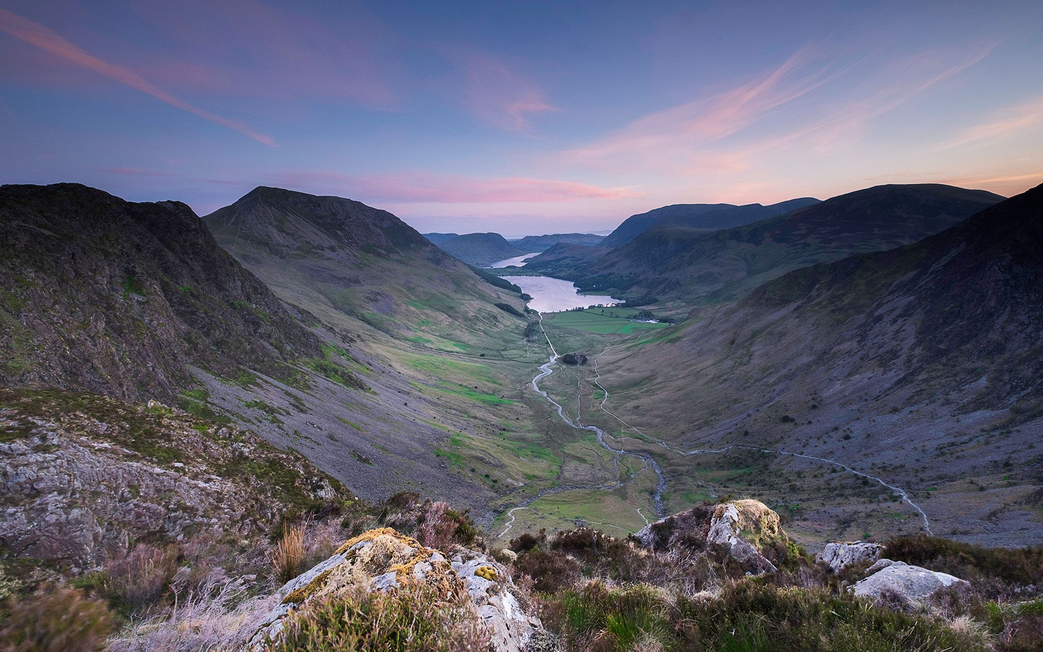Green crag overlooking Buttermere, United Kingdom
