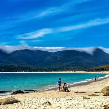 Wine Glass bay clouds on mountains Tasmania, Australia
