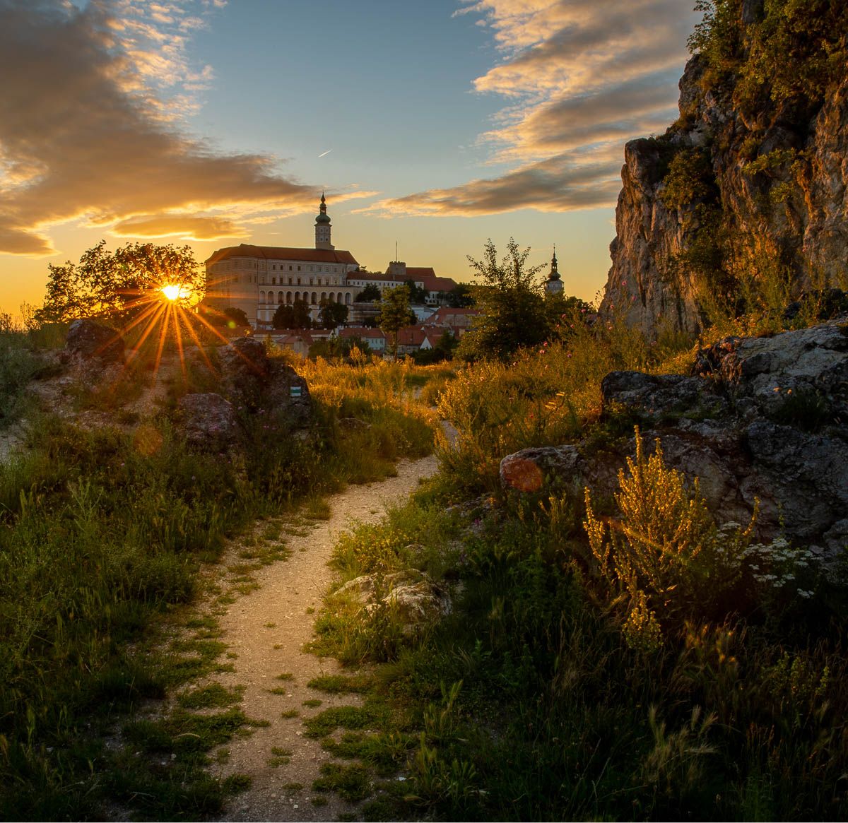 Sunset in the garden with the view of Mikulov castle., Czech Republic