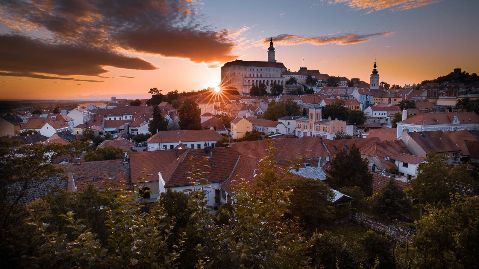 Sunset in the garden with the view of Mikulov castle., Czech Republic