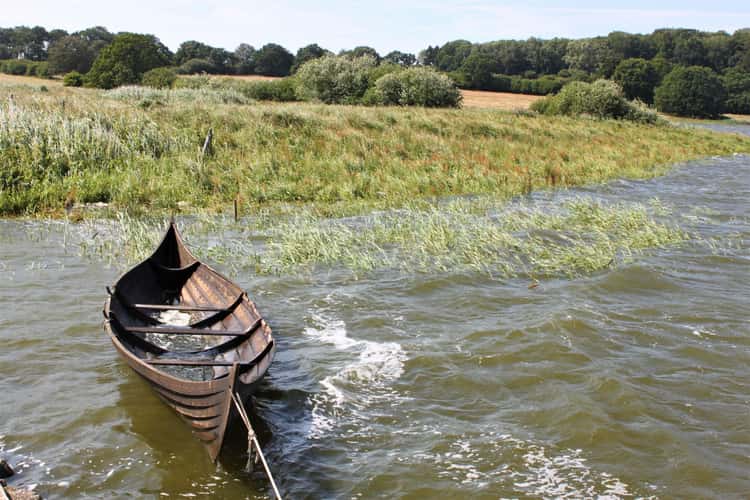 Viking boat in Haithabu harbor, Schleswig