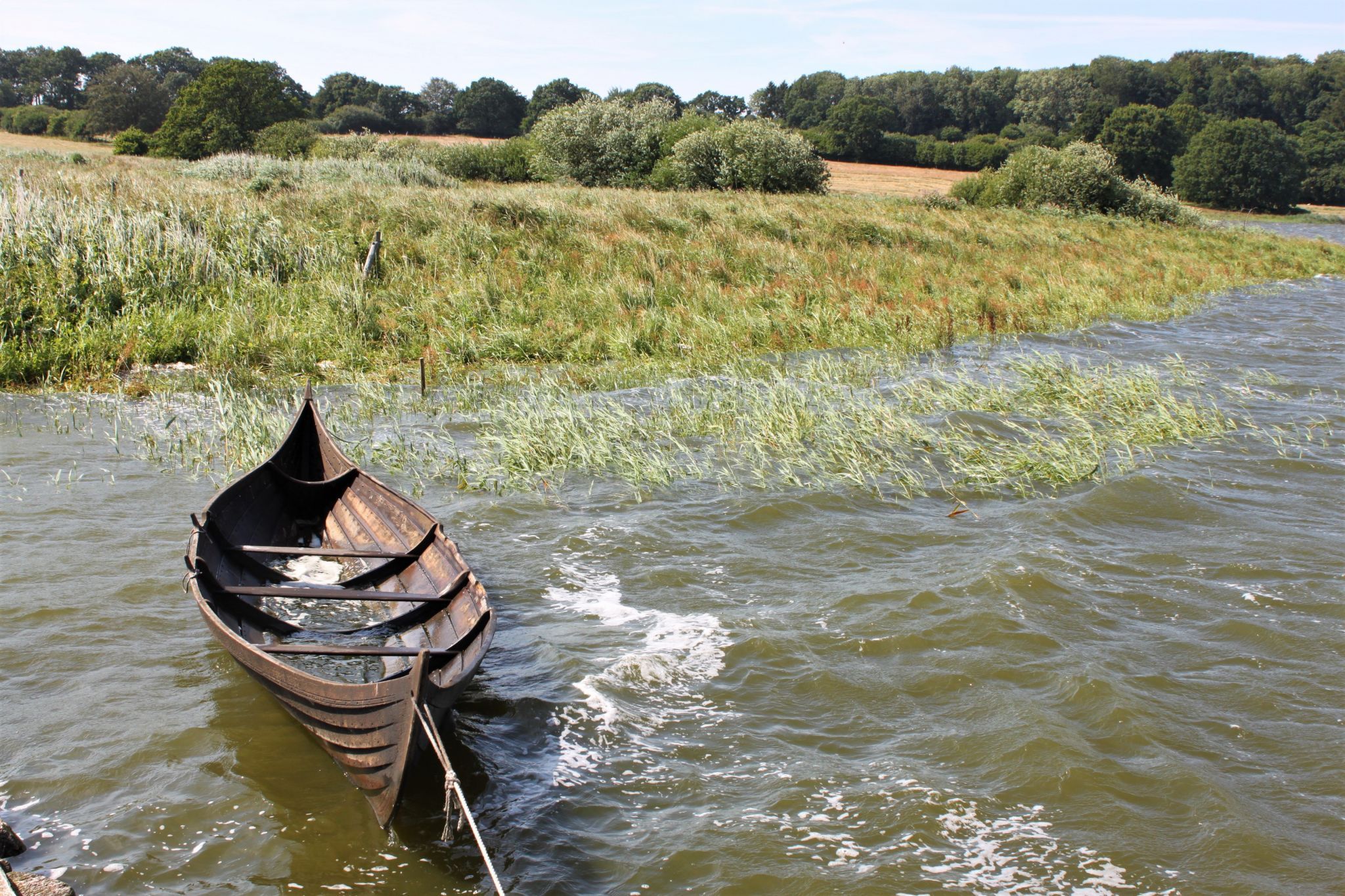 Viking boat in Haithabu harbor, Schleswig, Germany