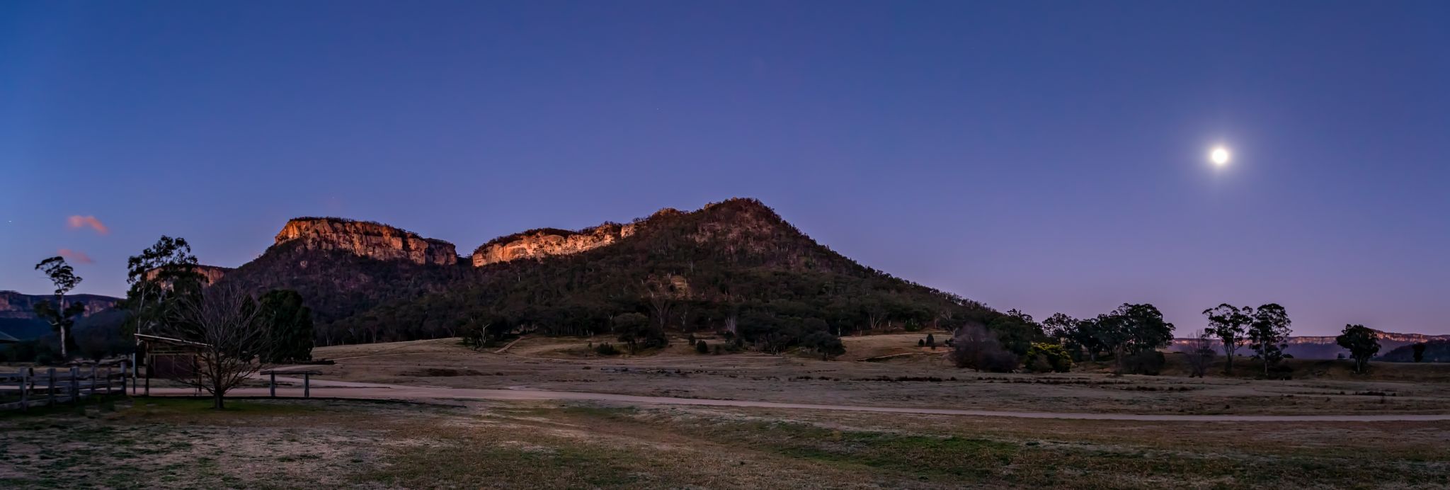 Moon set and sunrise Wolgan Valley New South Wales, Australia
