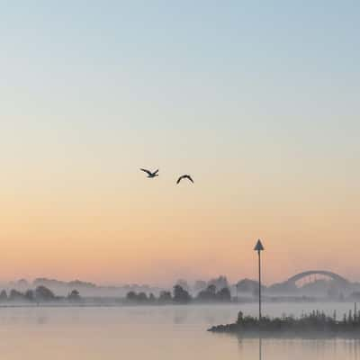 River Lek on a misty morning, Netherlands