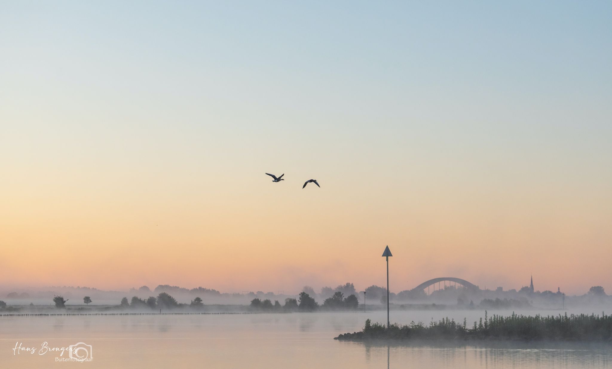 River Lek on a misty morning, Netherlands