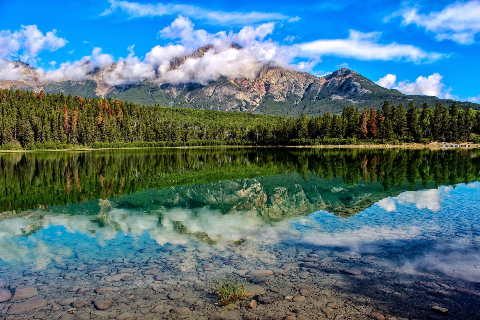 Pyramid lake with Mt Edith Cavell as distant background, Canada