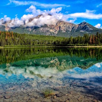 Pyramid lake with Mt Edith Cavell as distant background, Canada