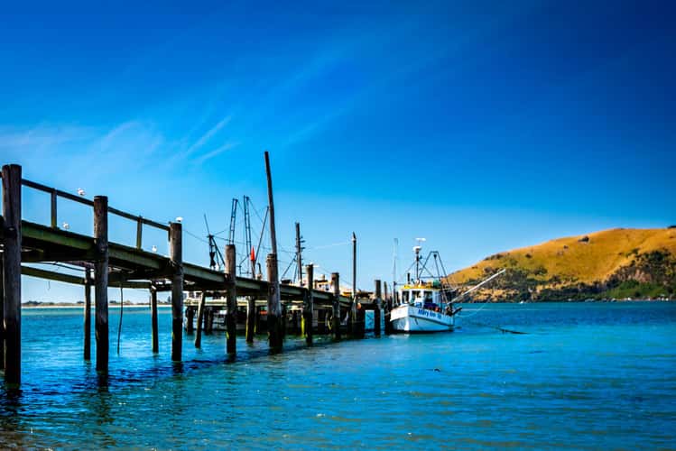 Jetty & fishing boat, Otakou, South Island