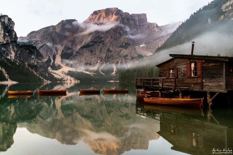 Wooden house on Lago Braies in Dolomites