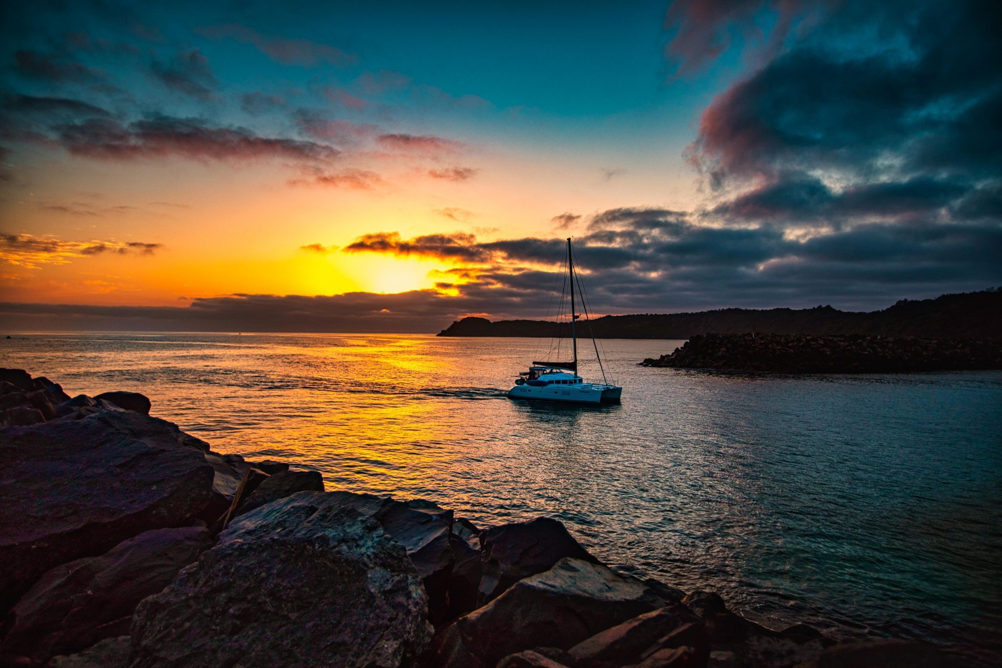 Boat leaving the breakwater, North Haven New South Wales, Australia