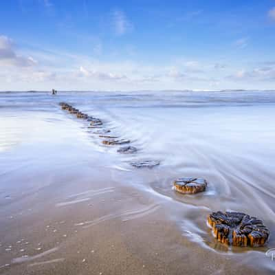 Small posts on the coast, Netherlands