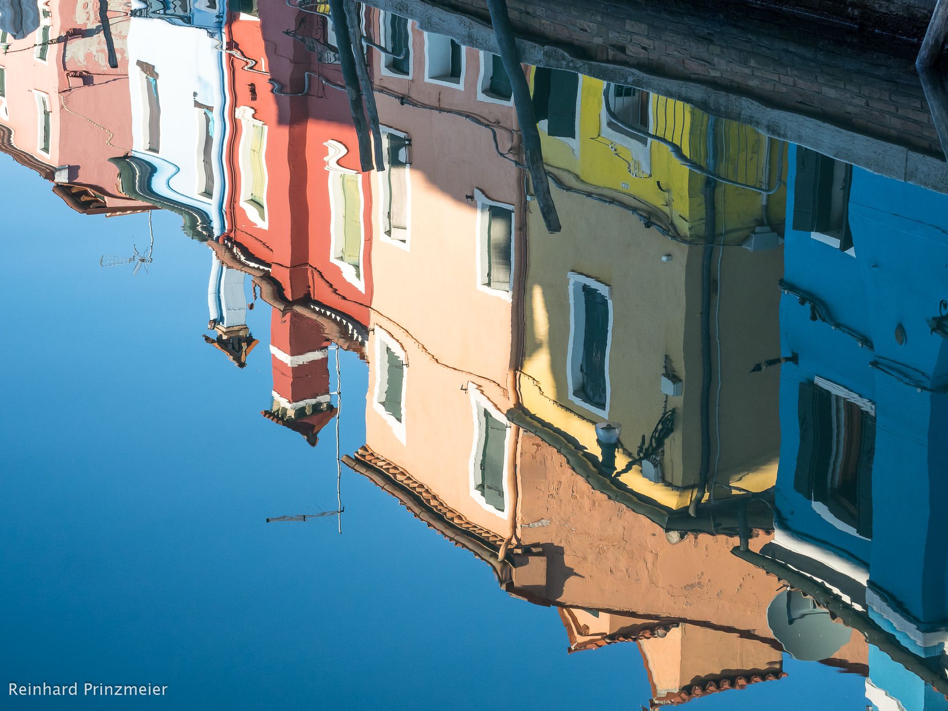 Water reflection in Burano, Italy