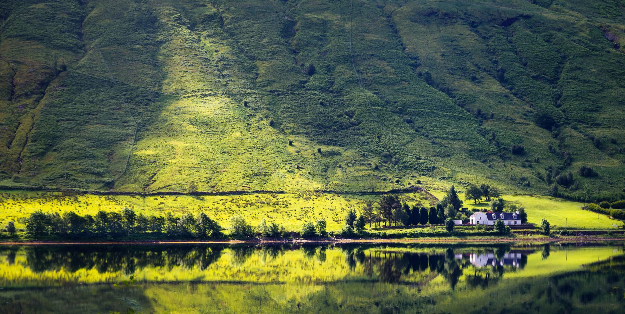House at fjord near Cairndow, Scotland, United Kingdom