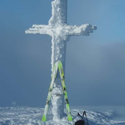 Grössenberg - Summit cross in winter time, Austria