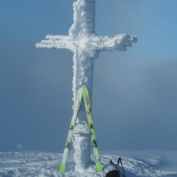 Grössenberg - Summit cross in winter time, Austria