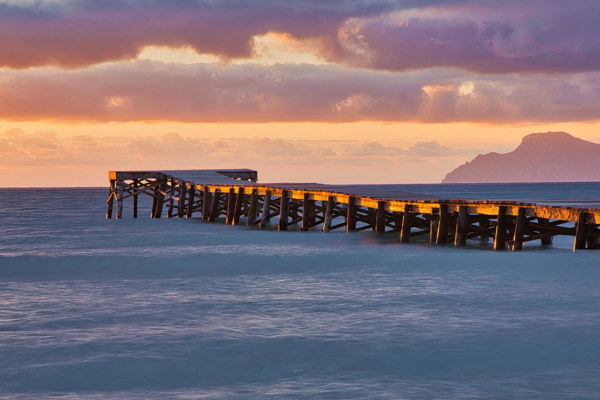 Wooden walkway at Playa de Muro from the side, Spain