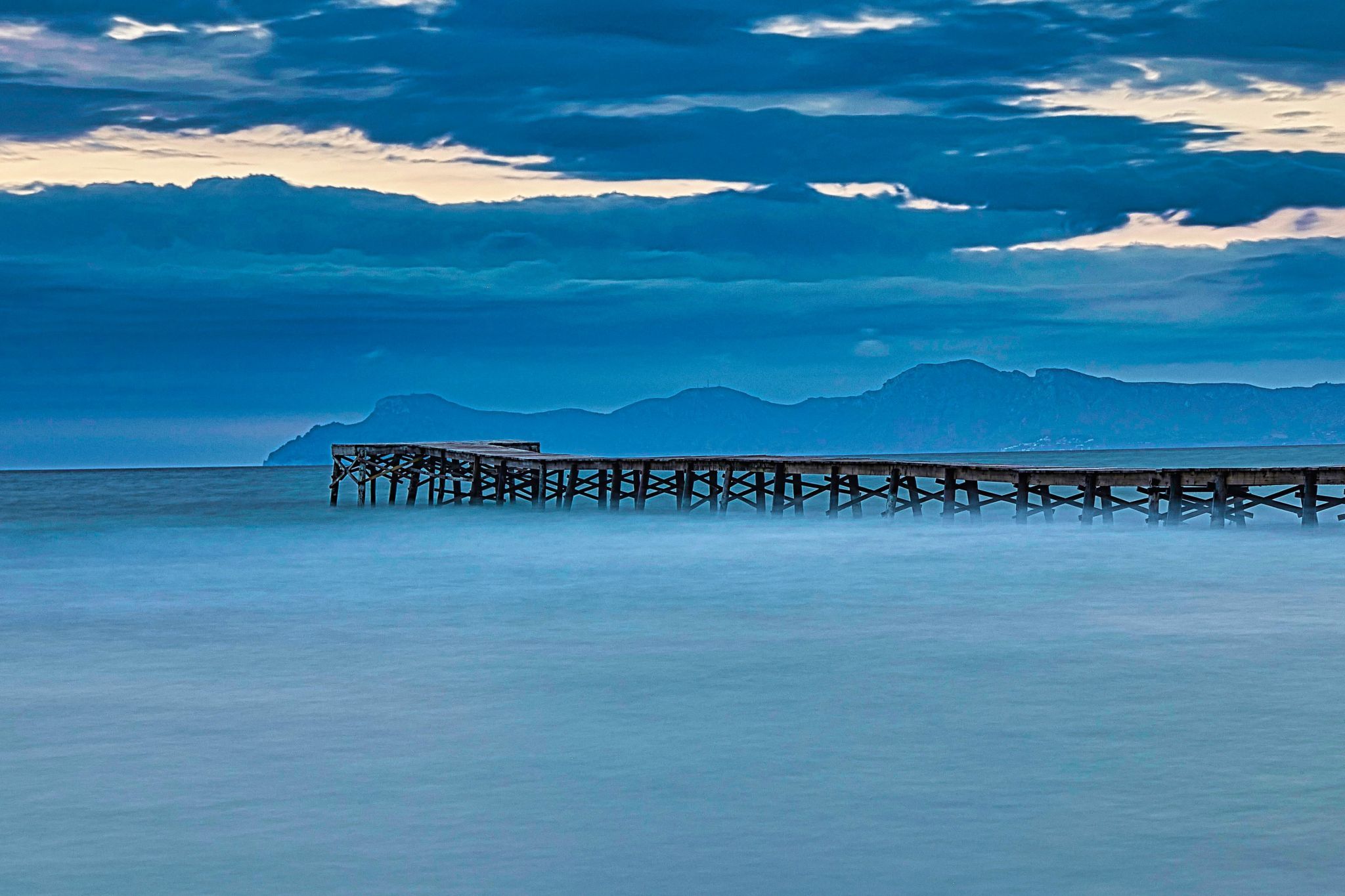 Wooden walkway at Playa de Muro from the side, Spain