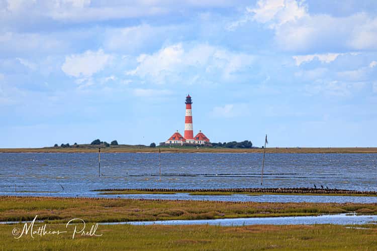 Tümlauer Bucht Blick zum Leuchtturm Westerheversand