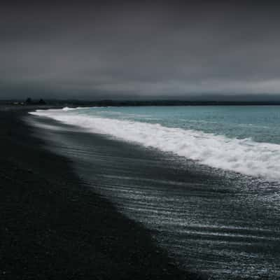 Black beach of Kaikoura, New Zealand