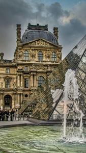 Louvre Museum Entrance with fountain, Paris