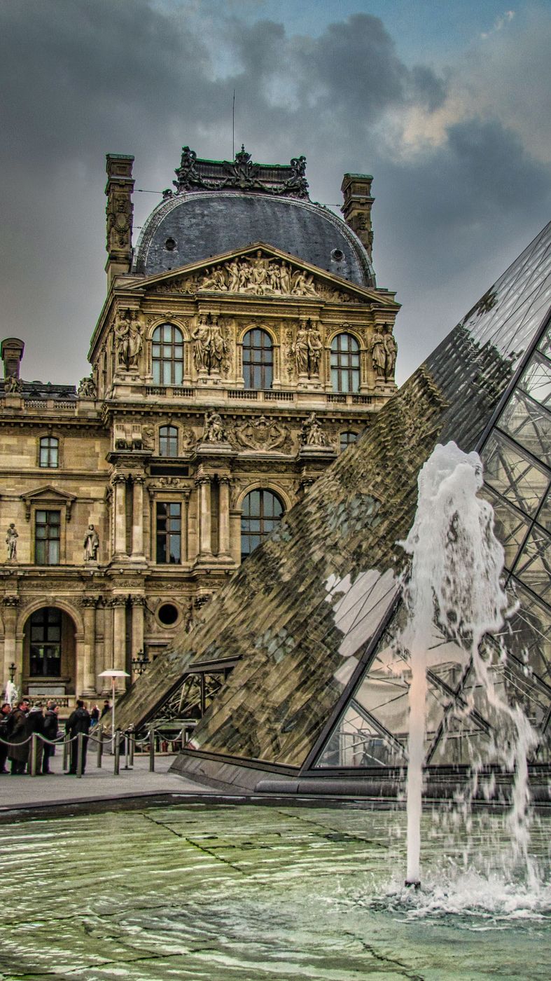 Louvre Museum Entrance with fountain, Paris, France