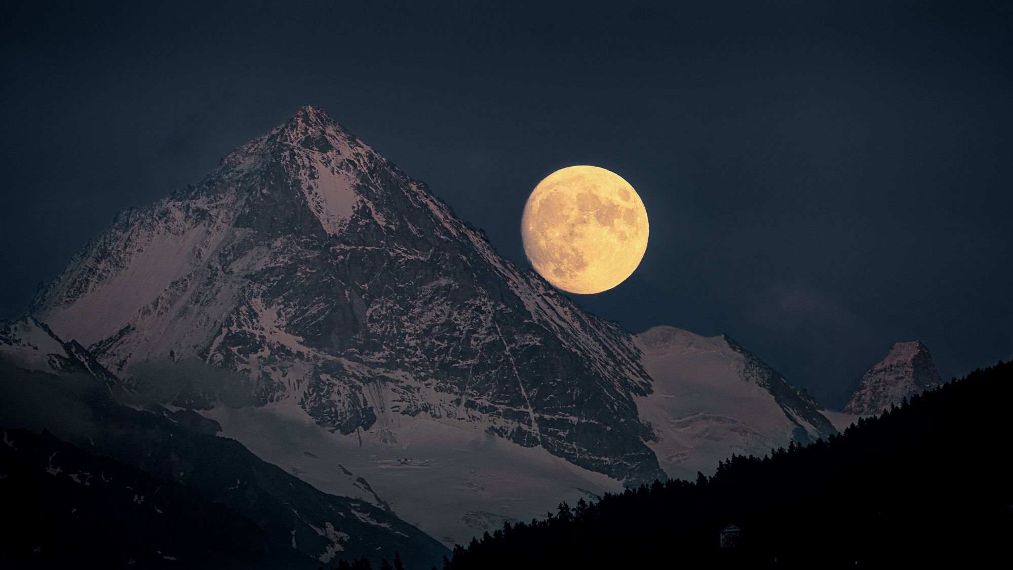 Moon rising in Val d'Herens, Switzerland