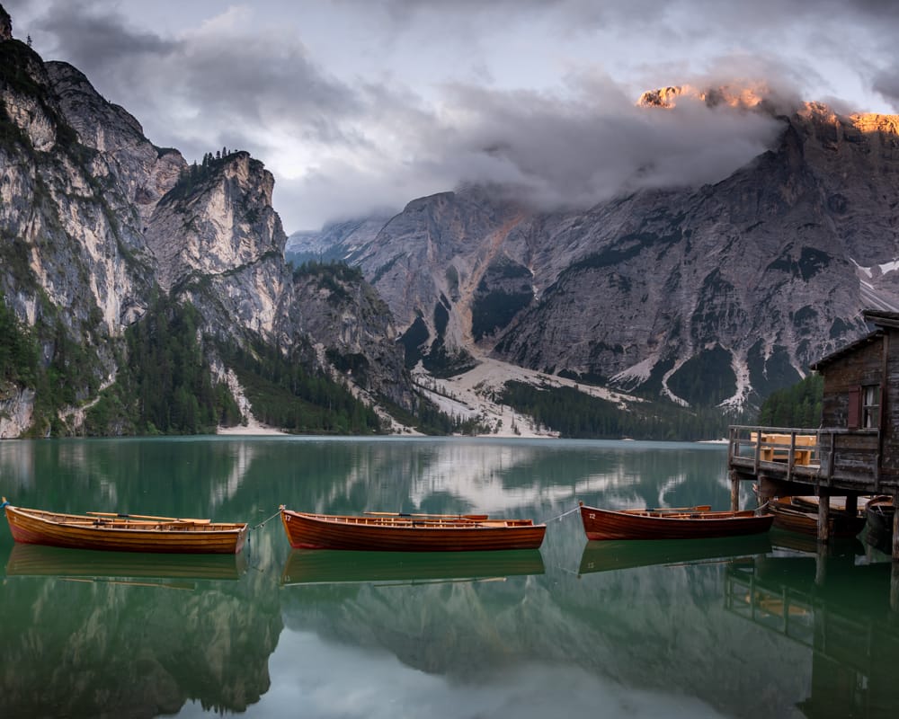 Wooden house on Lago Braies in Dolomites, Italy