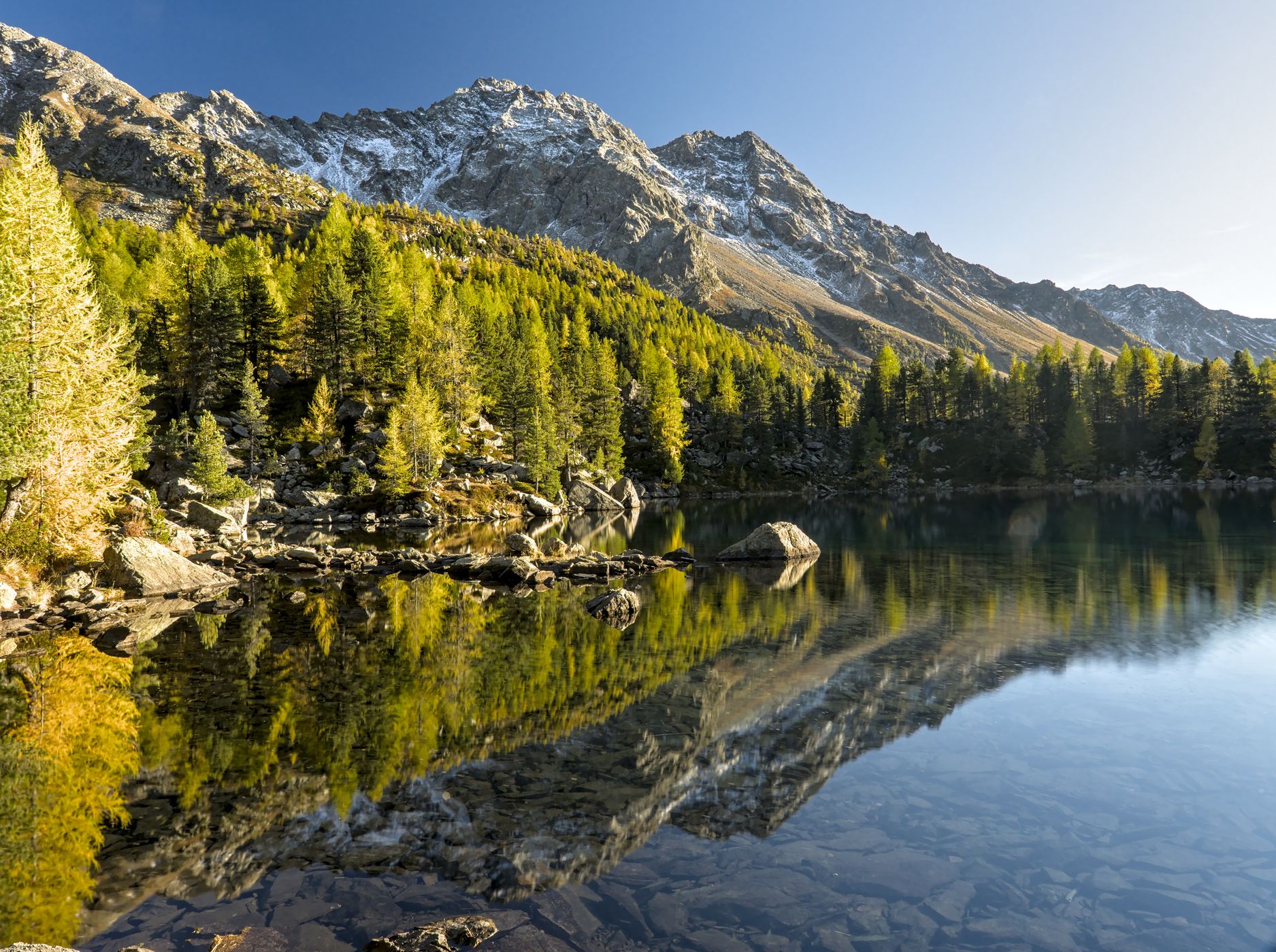 Golden season at Lago di Saoseo, Switzerland