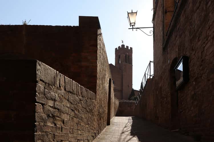 Medieval alley with a view of the Basilica di San Domenico