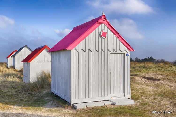 Beach cabins of Gouville sur Mer