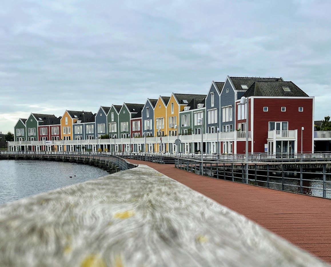 Rainbow colored houses on Rietplas, Houten, Netherlands