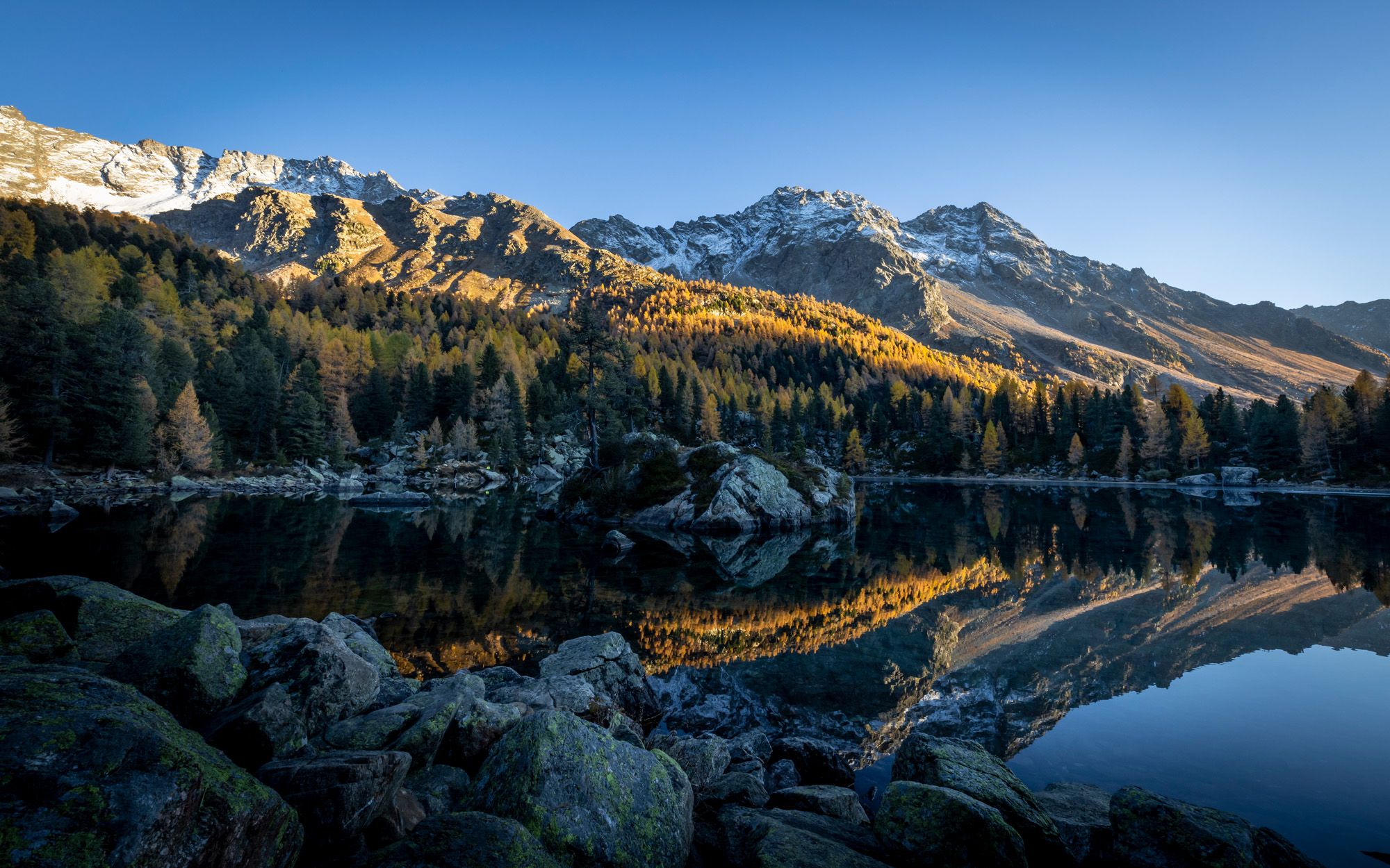 Golden season at Lago di Saoseo, Switzerland