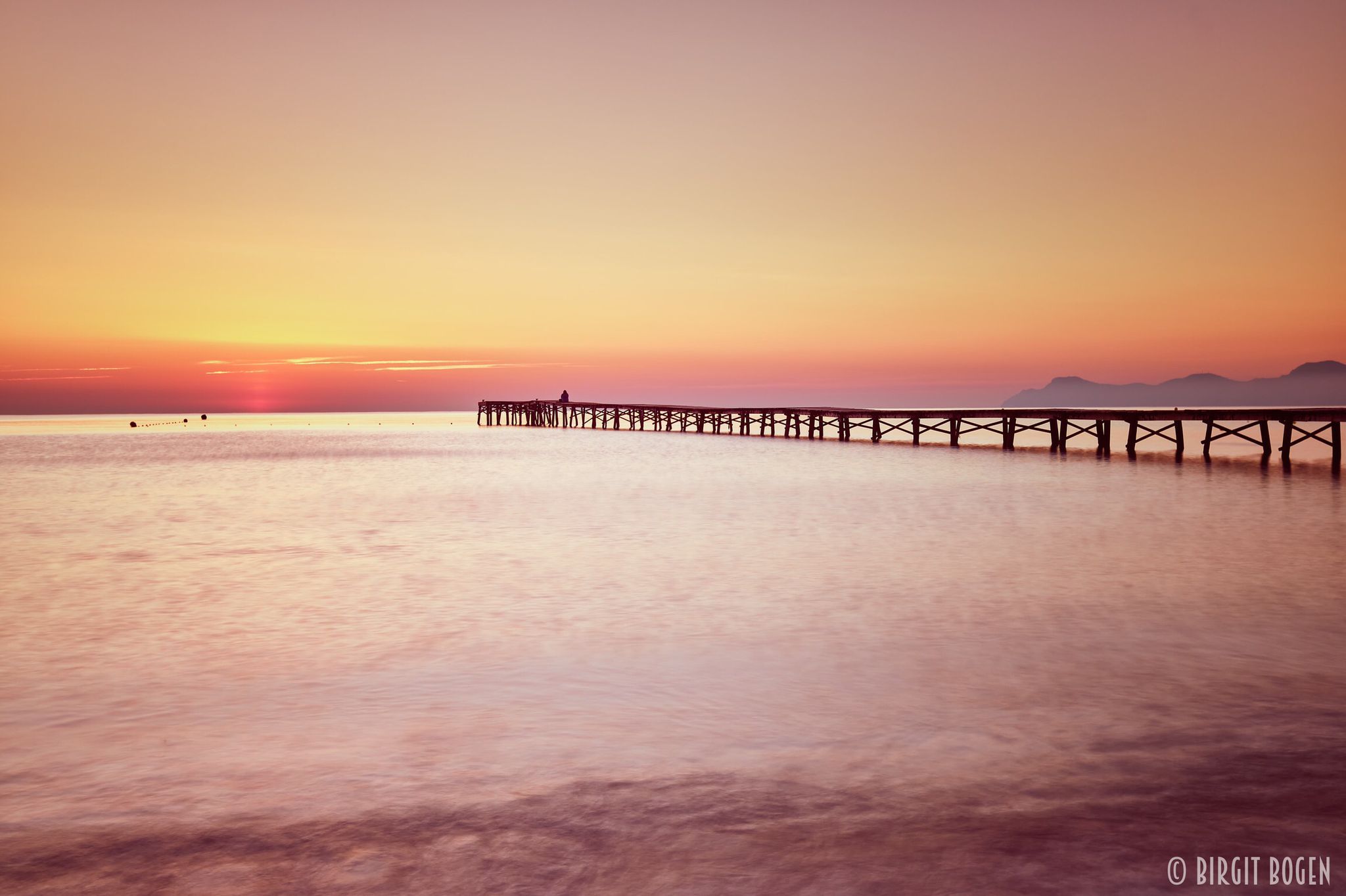 Wooden walkway at Playa de Muro from the side, Spain