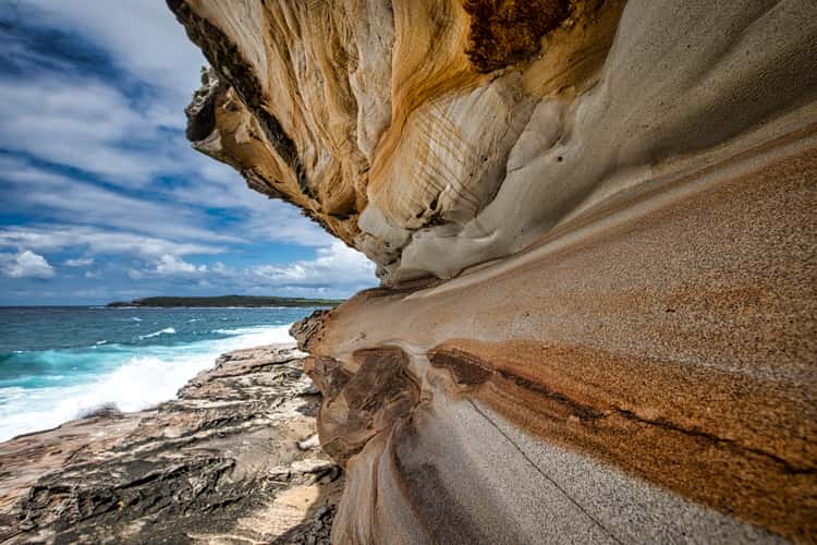 Sandstone coloured cliff face Maroubra, Sydney, NSW