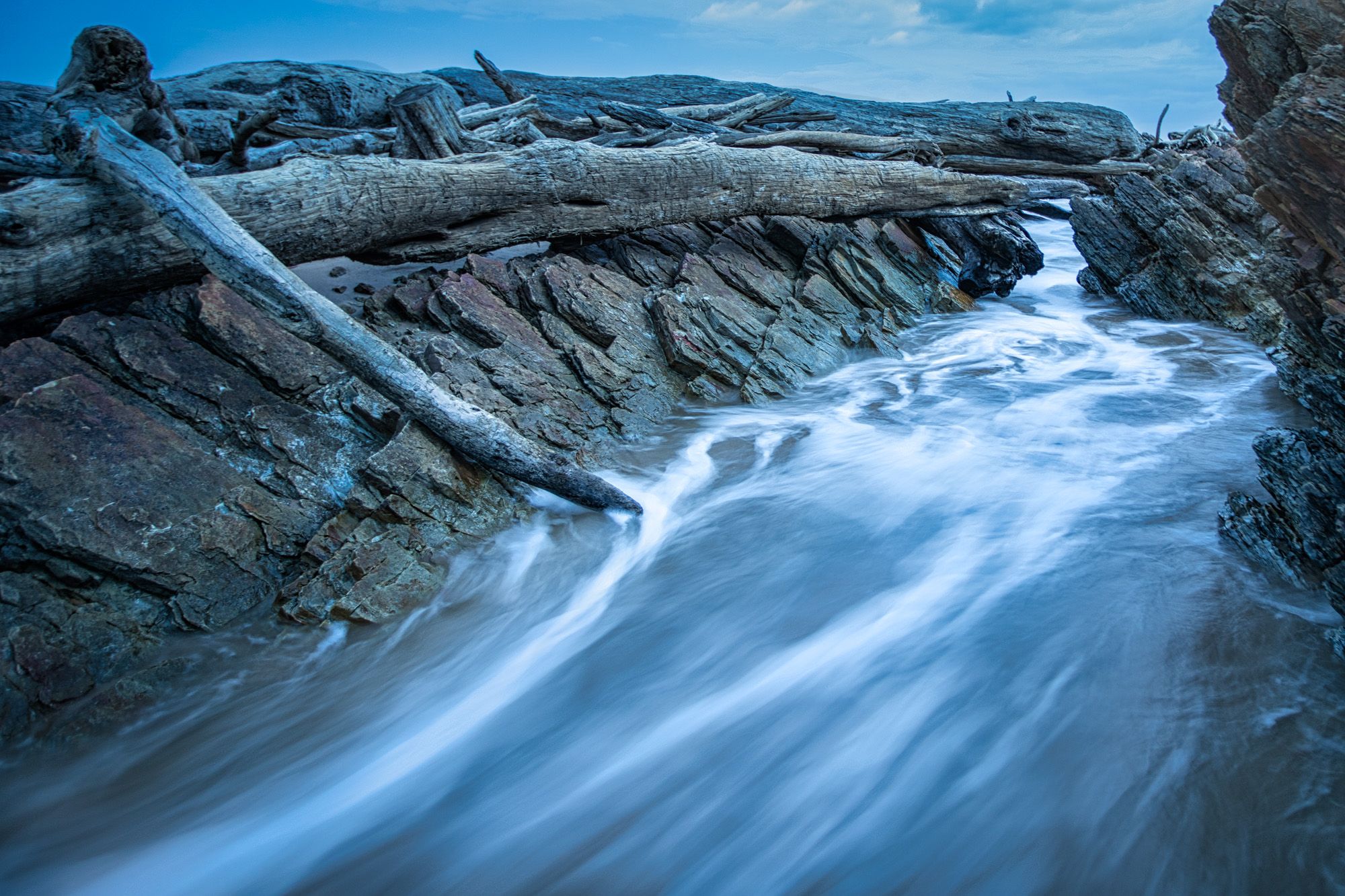 The rocks and Drifwood, Arthur River, Tasmania, Australia