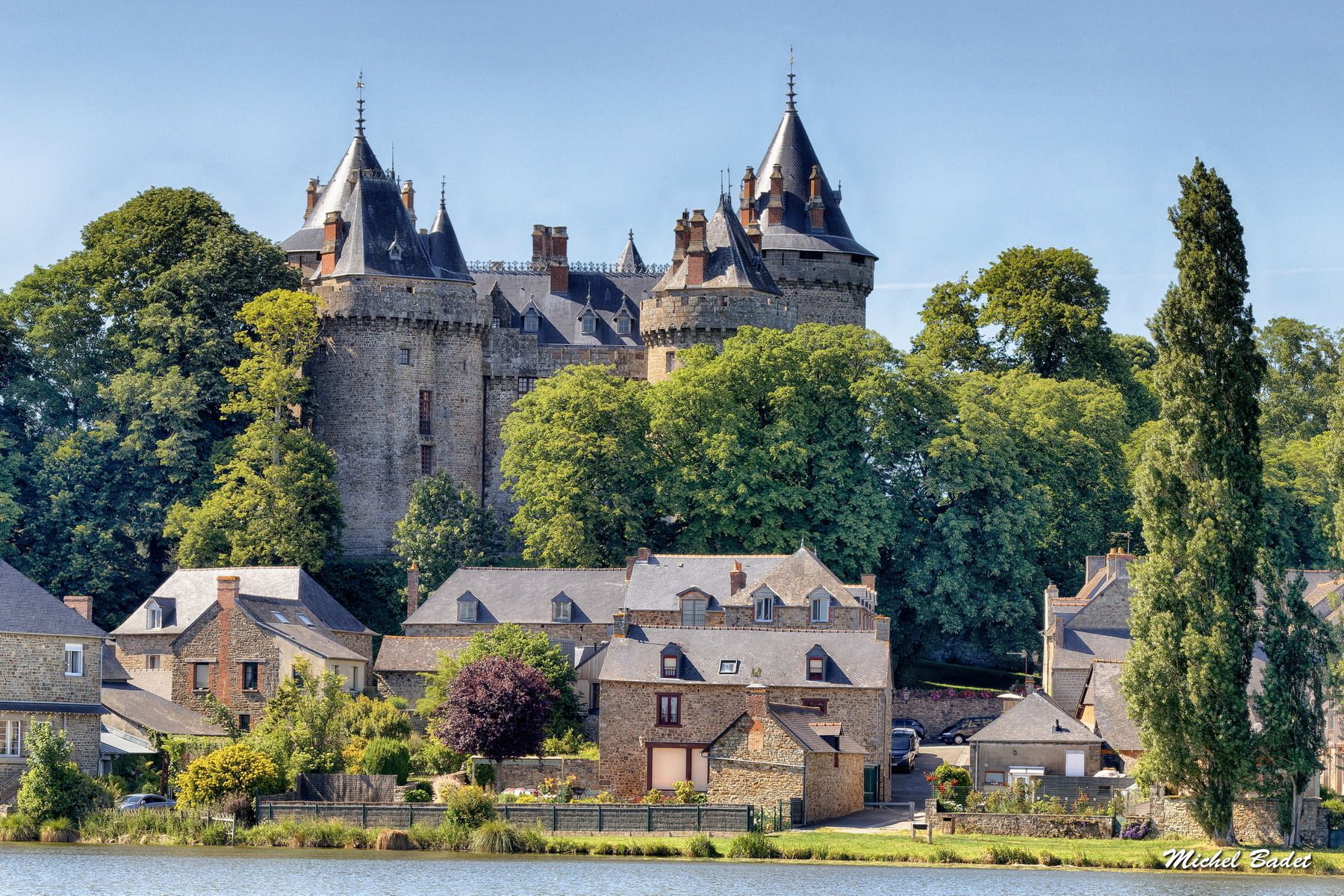 The castle of Combourg and the pond, France
