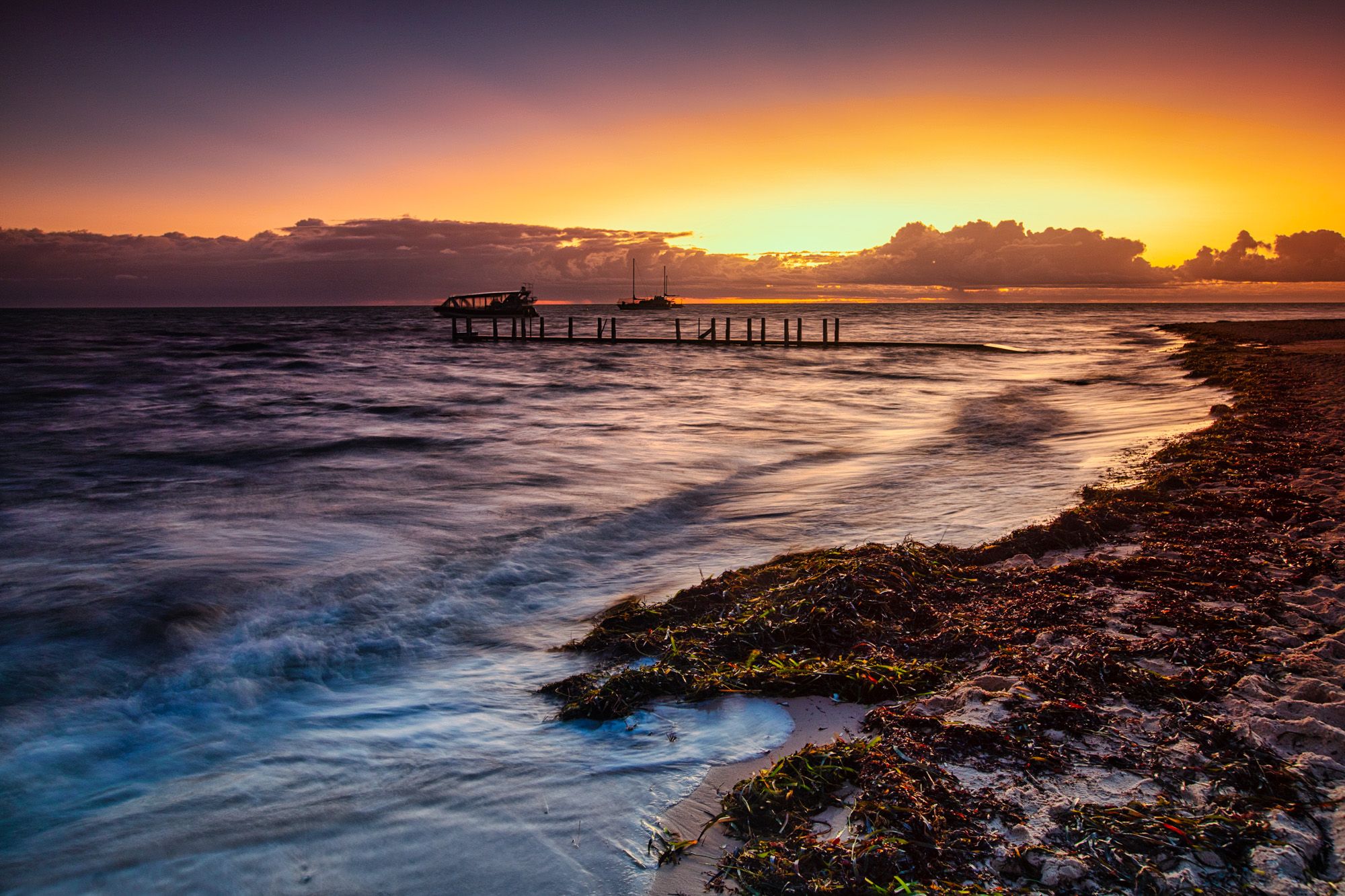 Two boats sunrise Monkey Mia, Western Australia, Australia