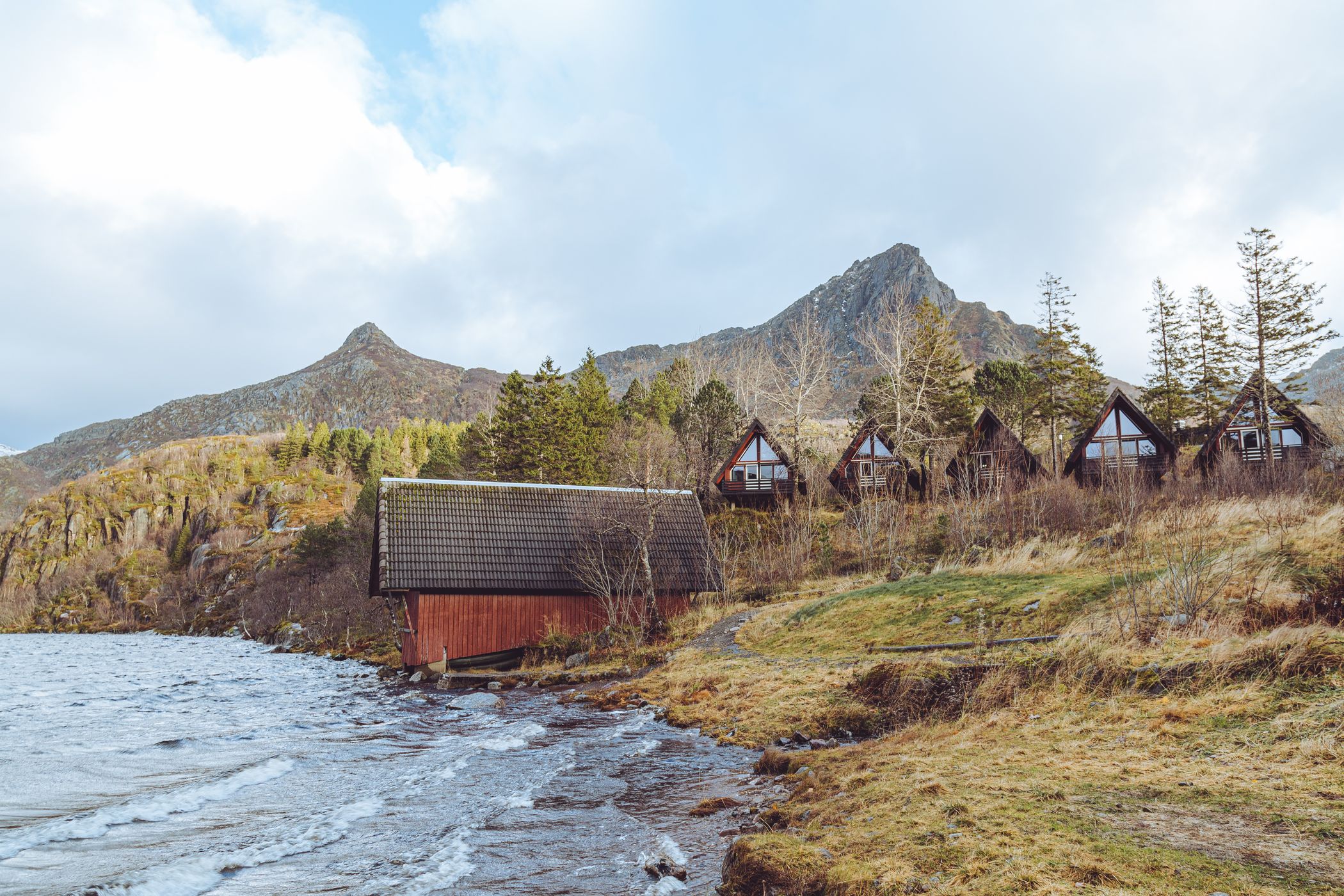 Red houses in front of mountains, Norway
