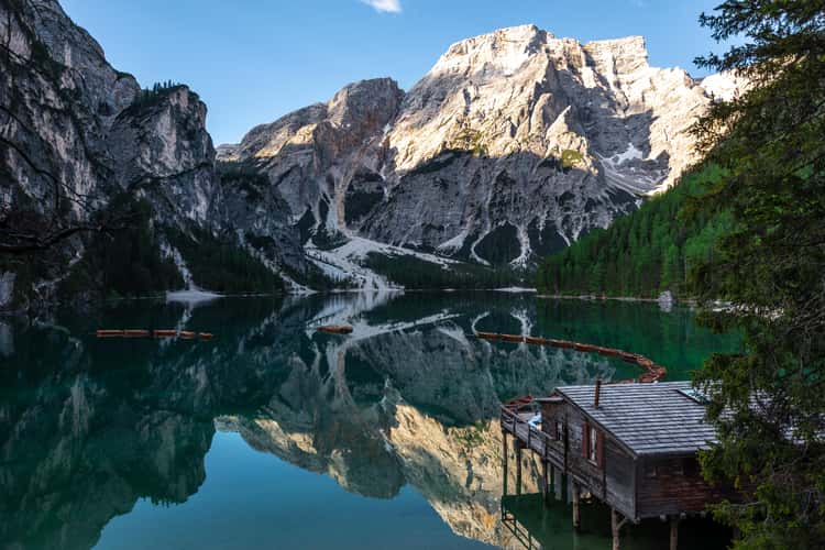 Wooden house on Lago Braies in Dolomites