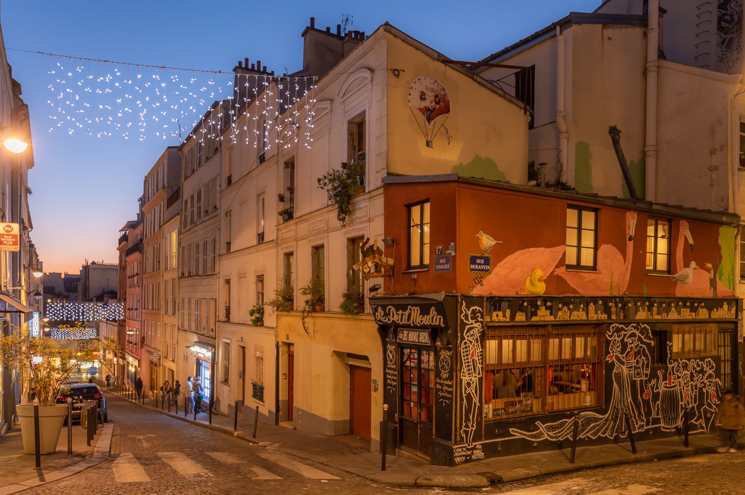 Street corner cafe in Montmartre, Paris, France
